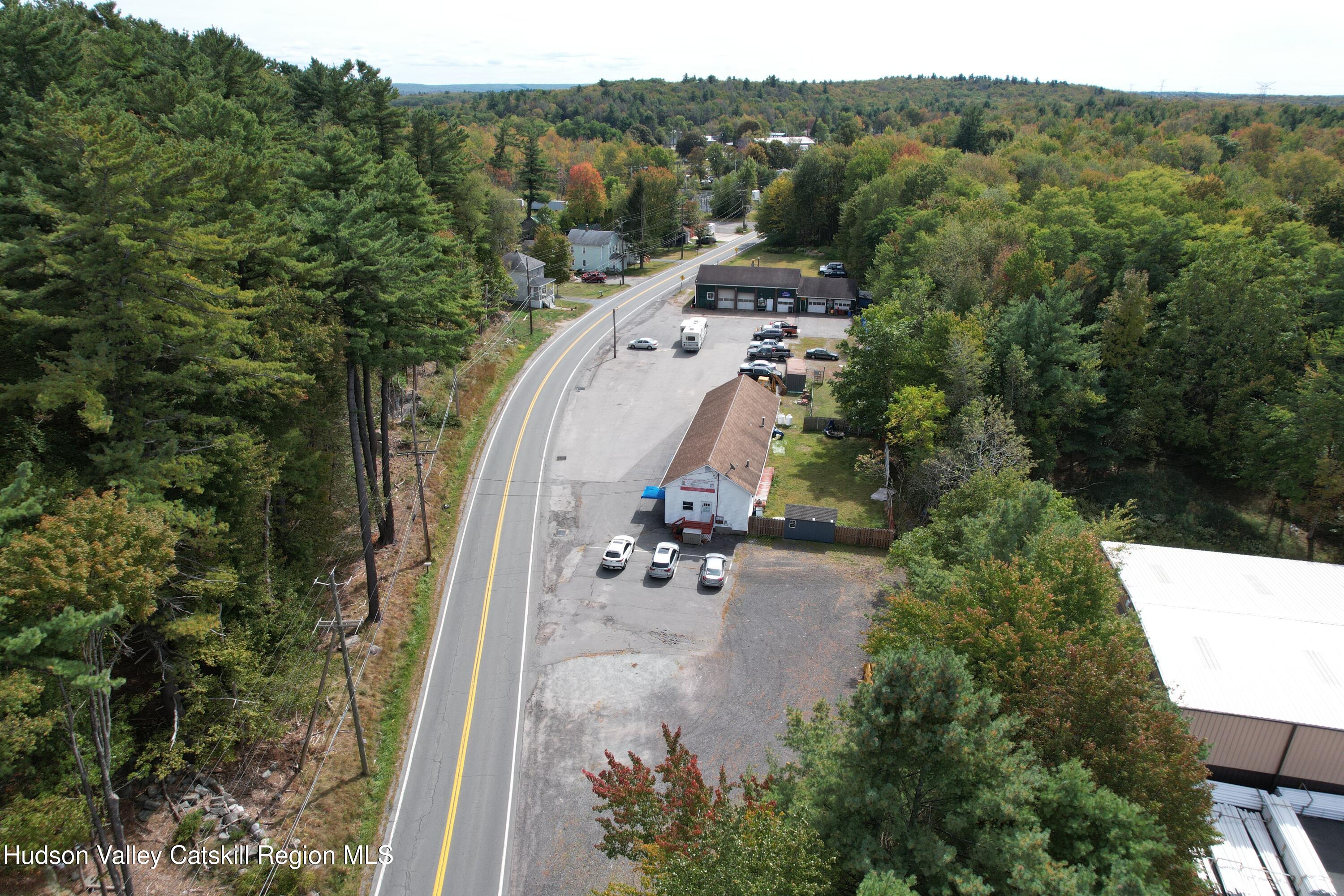 36 Cold Spring Road Monticello, NY 12701 - Photo 30 of 35 an aerial view of a house with mountain view