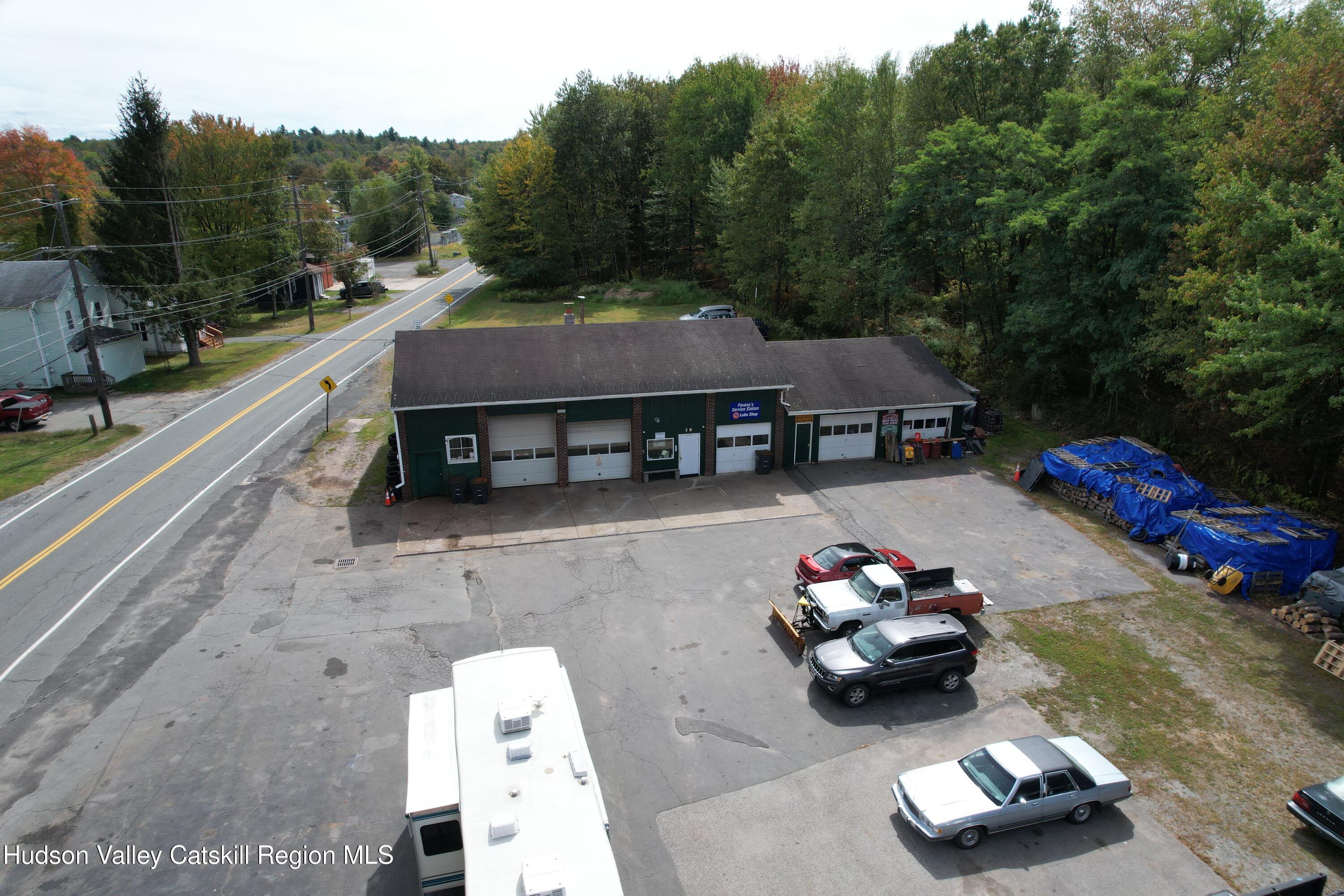 36 Cold Spring Road Monticello, NY 12701 - Photo 34 of 35 a car parked in front of a house