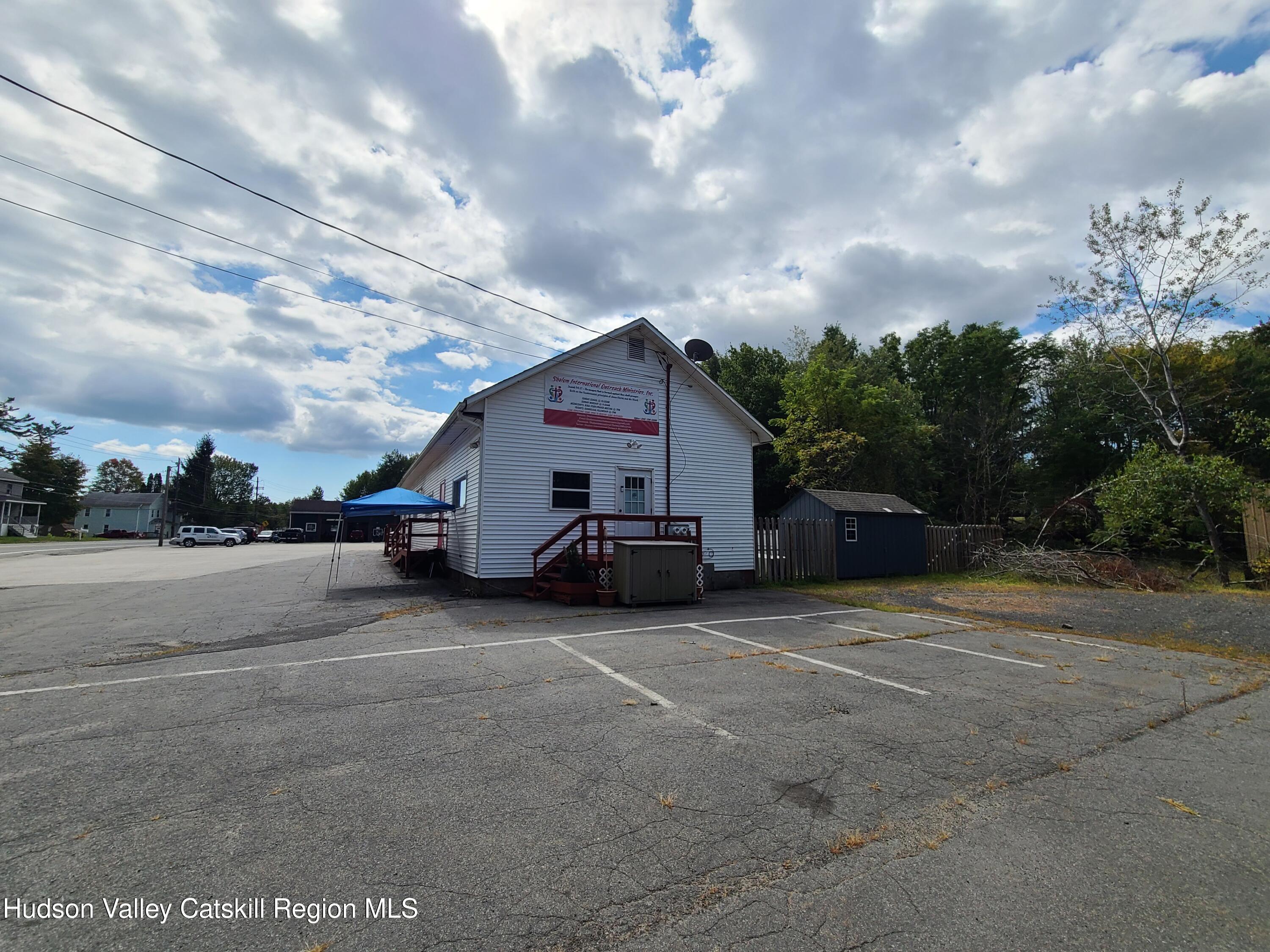 36 Cold Spring Road Monticello, NY 12701 - Photo 8 of 35 a view of a house with a yard