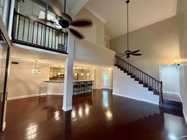 a view of gallery with wooden floor