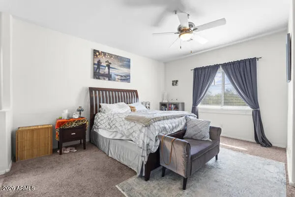 a bed room with a bed and a couch