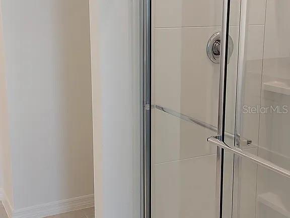 5800 Bullock Place St. Cloud, FL 34771 - Photo 2 of 4 a bathroom with a shower