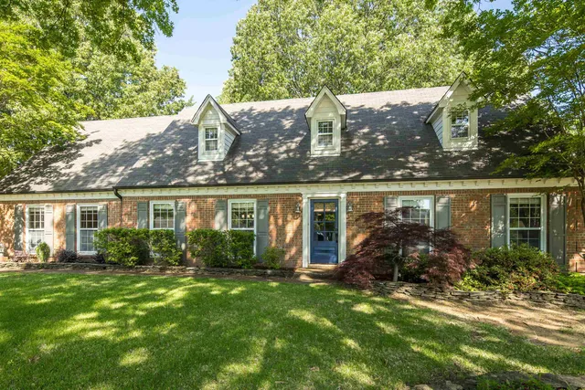 front view of house with a yard