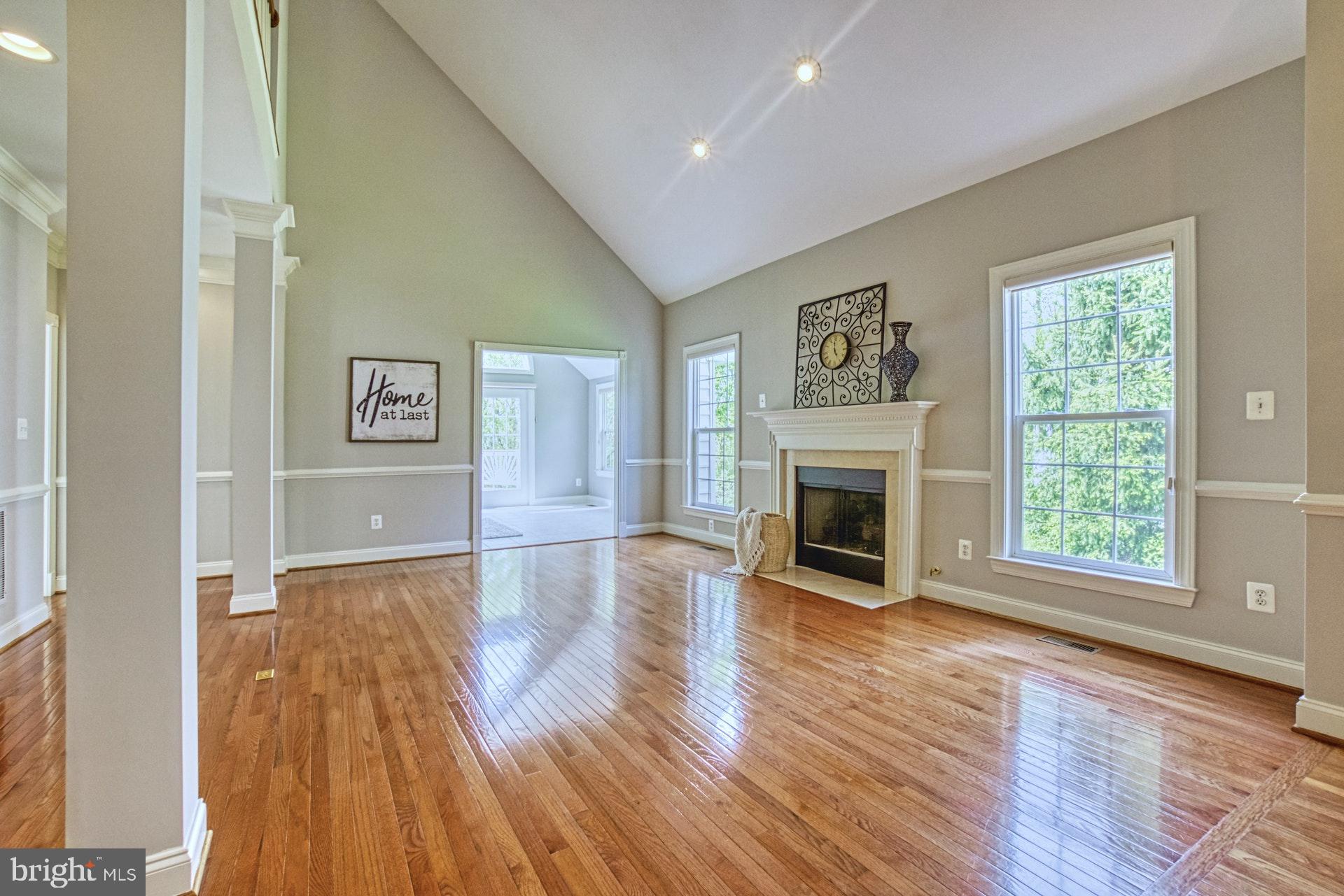 20052 Valhalla Square Ashburn, VA 20147 - Photo 4 of 30 GLEAMING HARDWOODS + NATURAL LIGHT