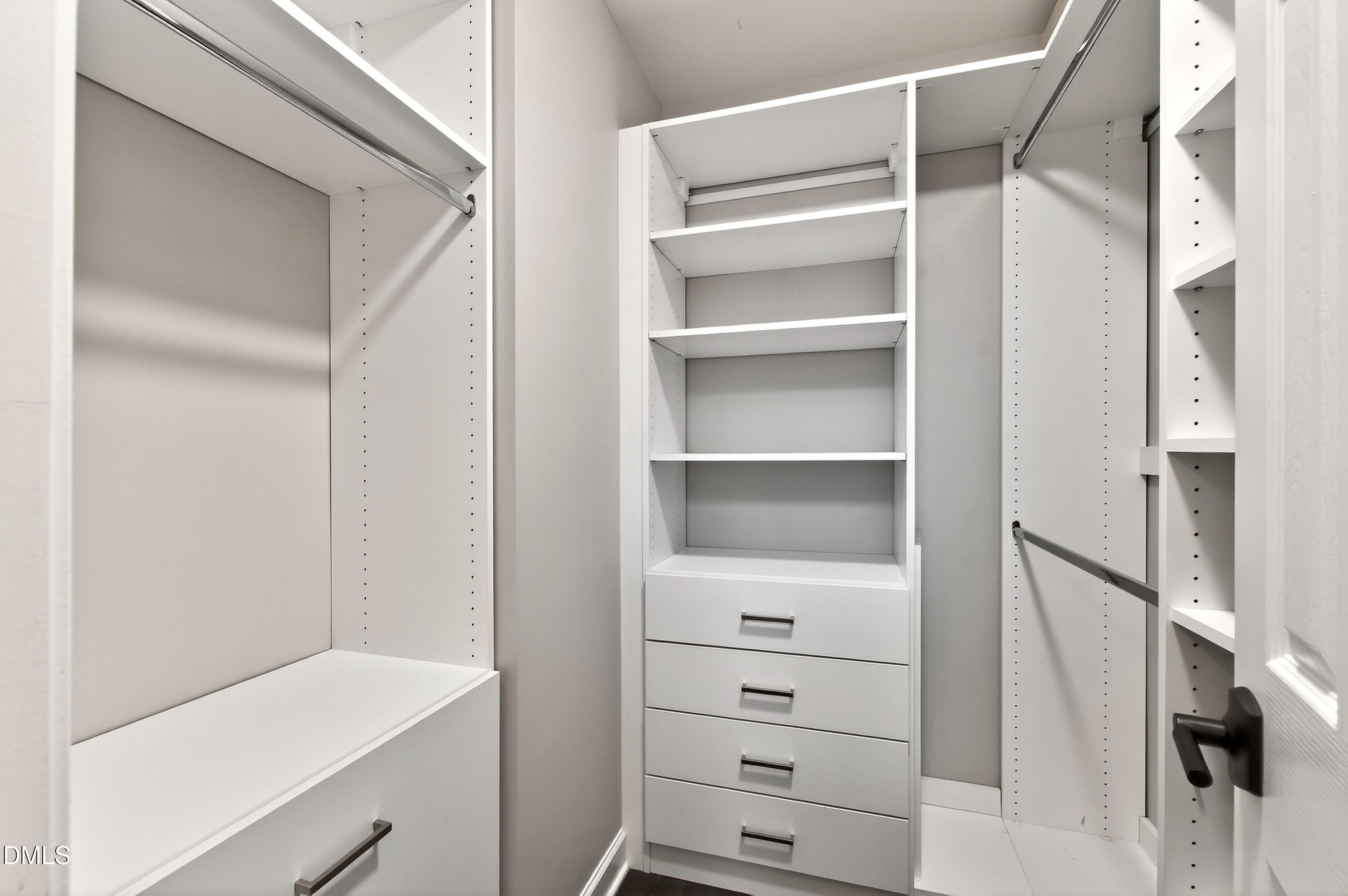 12408 Cilcain Court Raleigh, NC 27614 - Photo 45 of 80 a view of an empty walk in closet