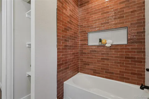 a bathroom with a bathtub