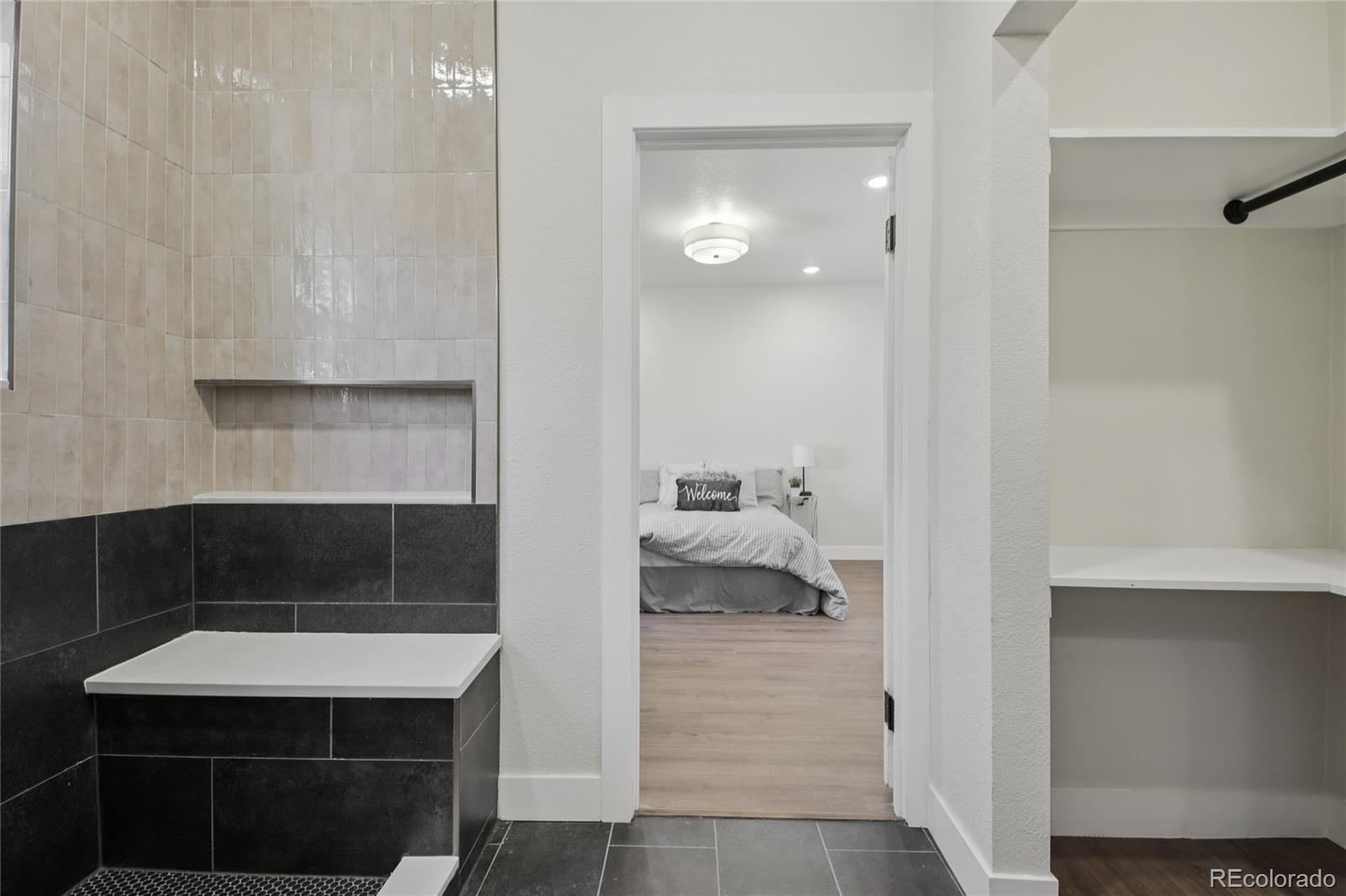 2342 Dexter Street Denver, CO 80207 - Photo 25 of 50 a bathroom with a sink and a mirror