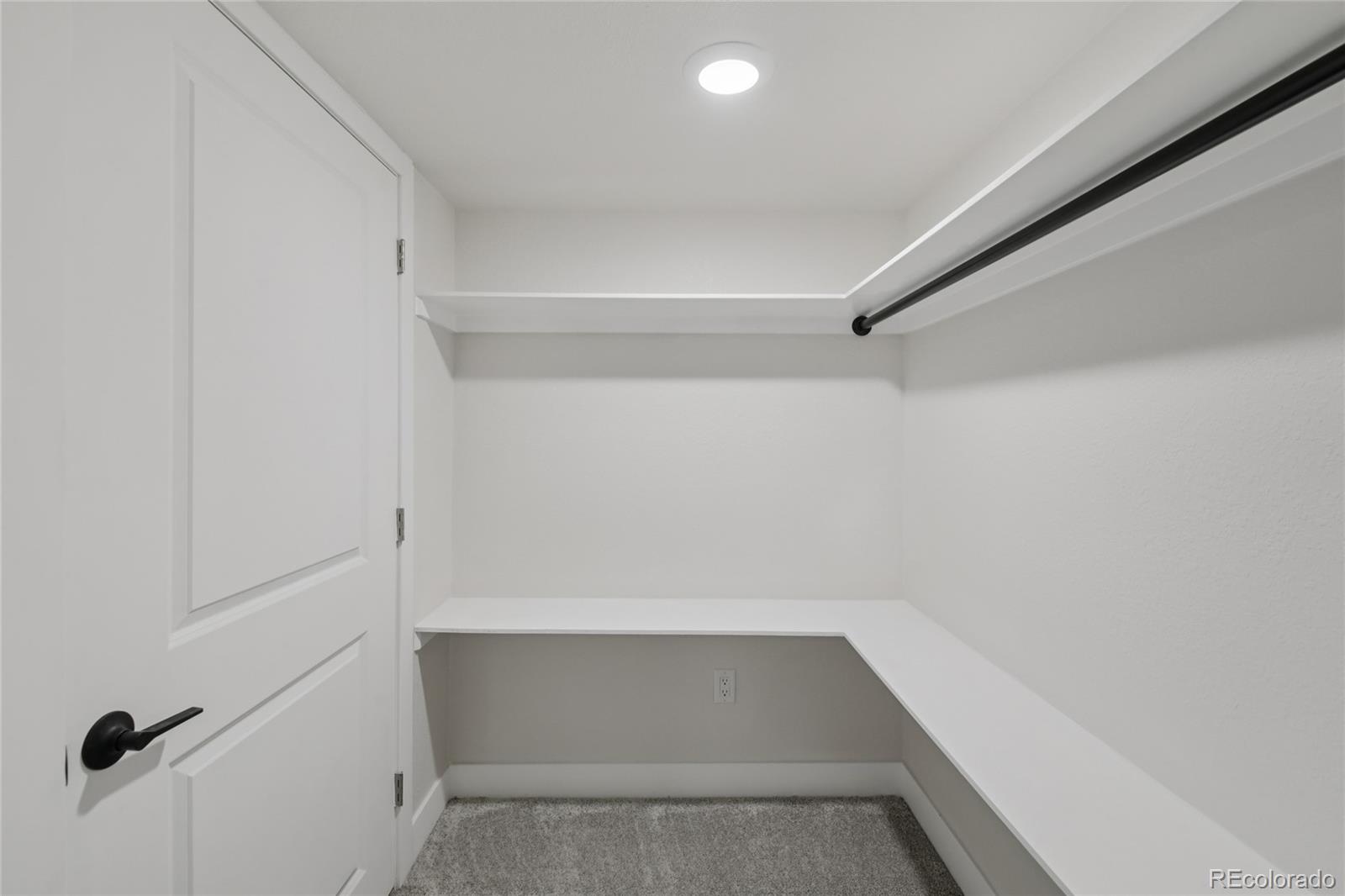 2342 Dexter Street Denver, CO 80207 - Photo 35 of 50 a view of an empty walk in closet