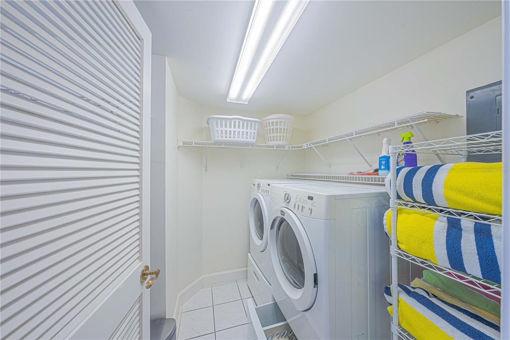 4575 South Atlantic Avenue, Unit 6607 Ponce Inlet, FL 32127 - Photo 32 of 48 a utility room with dryer and washer