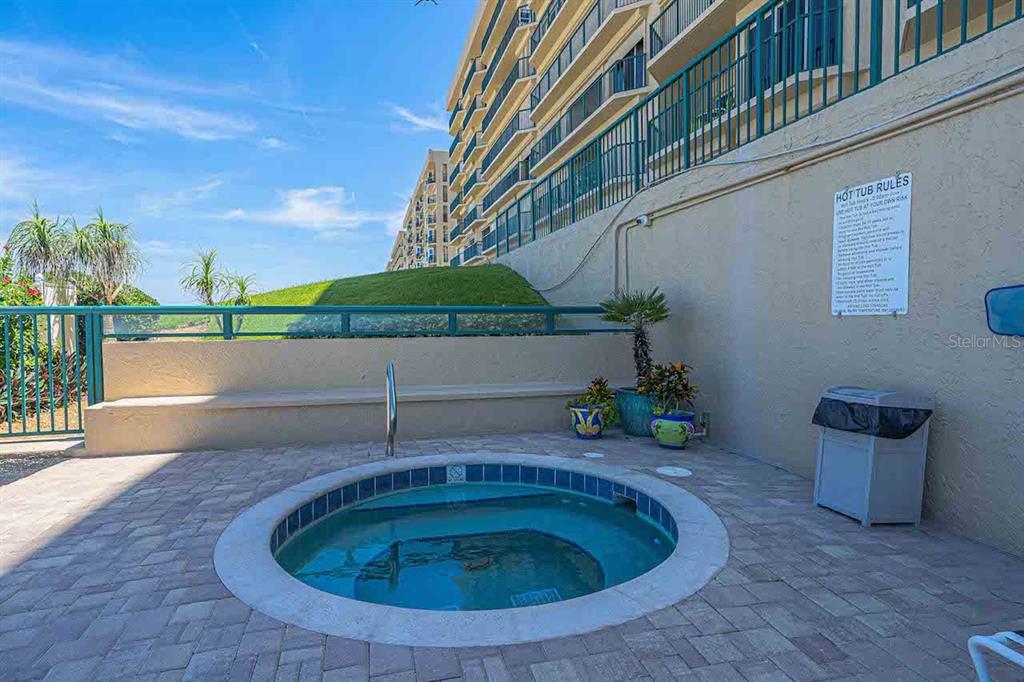 4575 South Atlantic Avenue, Unit 6607 Ponce Inlet, FL 32127 - Photo 37 of 48 a backyard of a house with a yard and outdoor seating