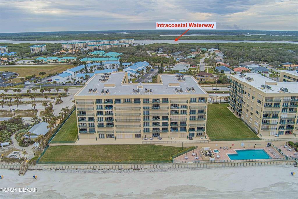 4575 South Atlantic Avenue, Unit 6607 Ponce Inlet, FL 32127 - Photo 42 of 48 a large building with a clock tower in the middle