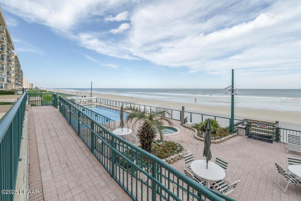 4575 South Atlantic Avenue, Unit 6607 Ponce Inlet, FL 32127 - Photo 43 of 48 a view of a balcony and wooden floor