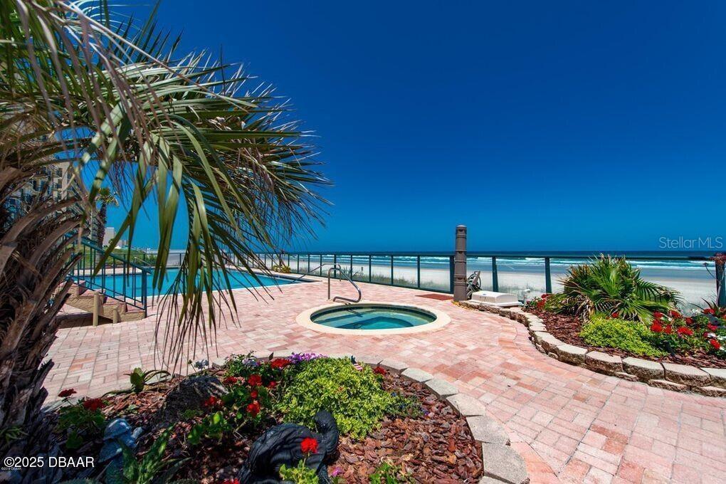 4575 South Atlantic Avenue, Unit 6607 Ponce Inlet, FL 32127 - Photo 45 of 48 a view of a backyard