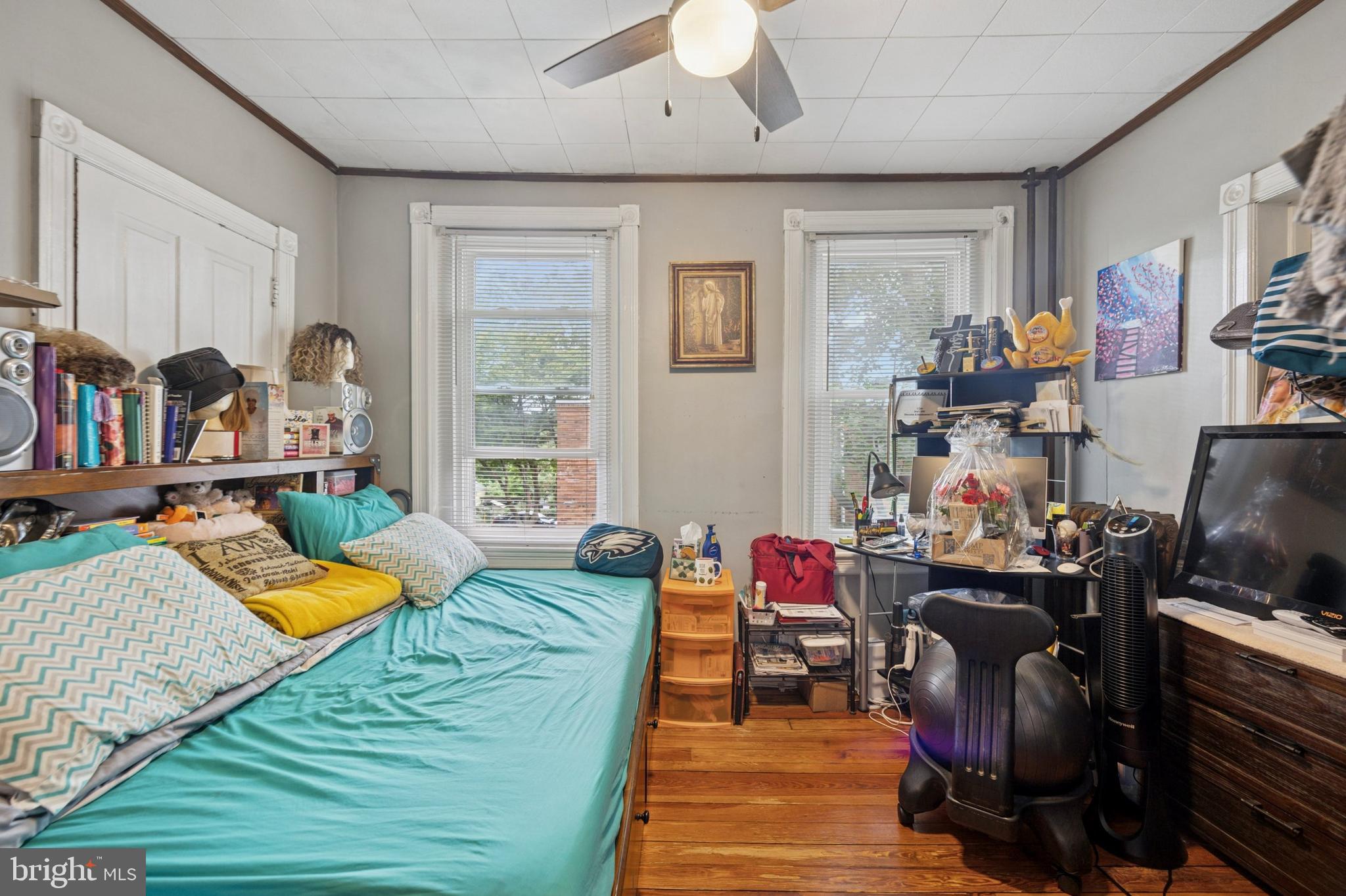 512 Crest Avenue Elkins Park, PA 19027 - Photo 20 of 24 a bed room with furniture and a flat screen tv