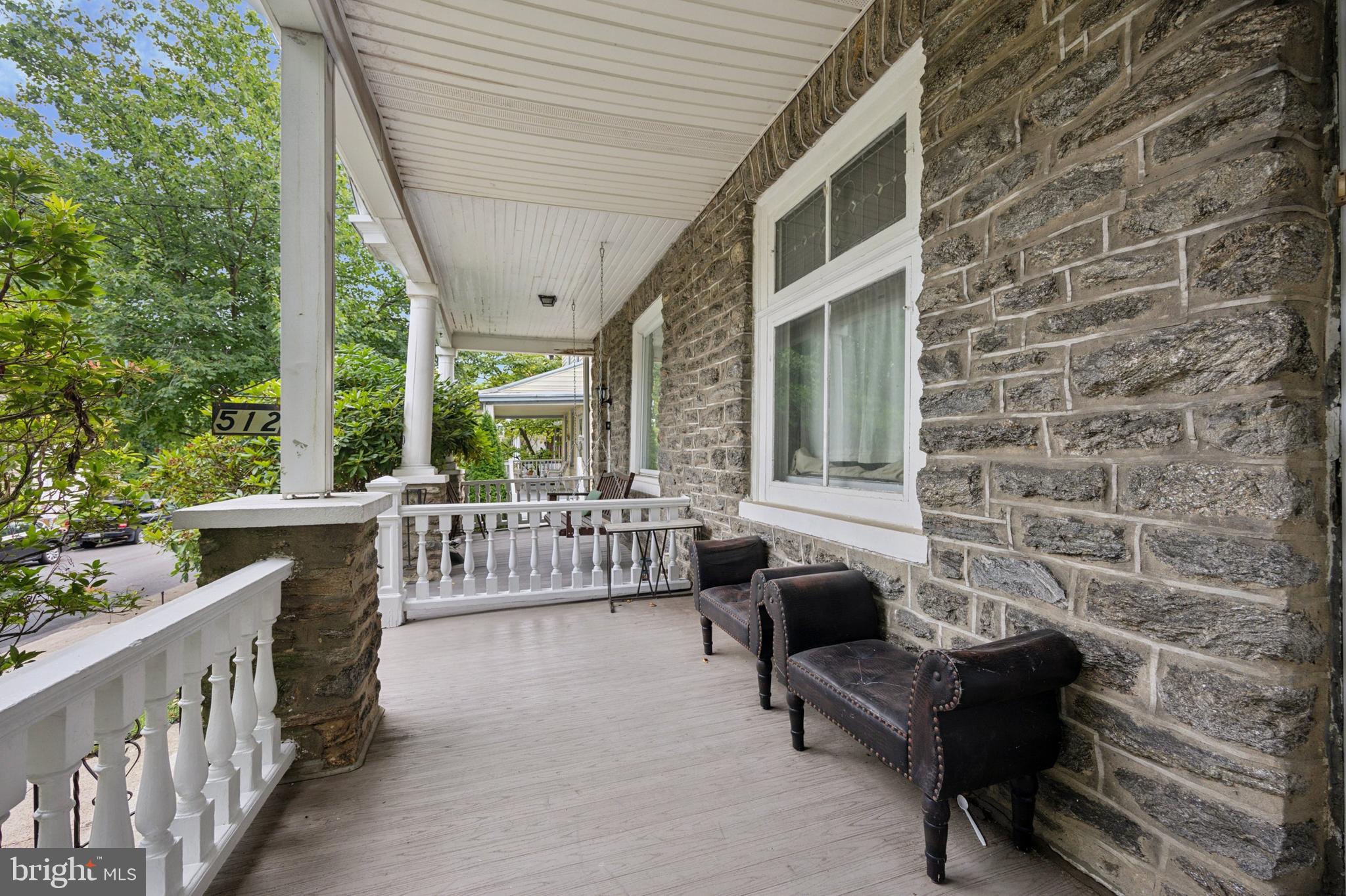 512 Crest Avenue Elkins Park, PA 19027 - Photo 3 of 24 a balcony with furniture and a gate