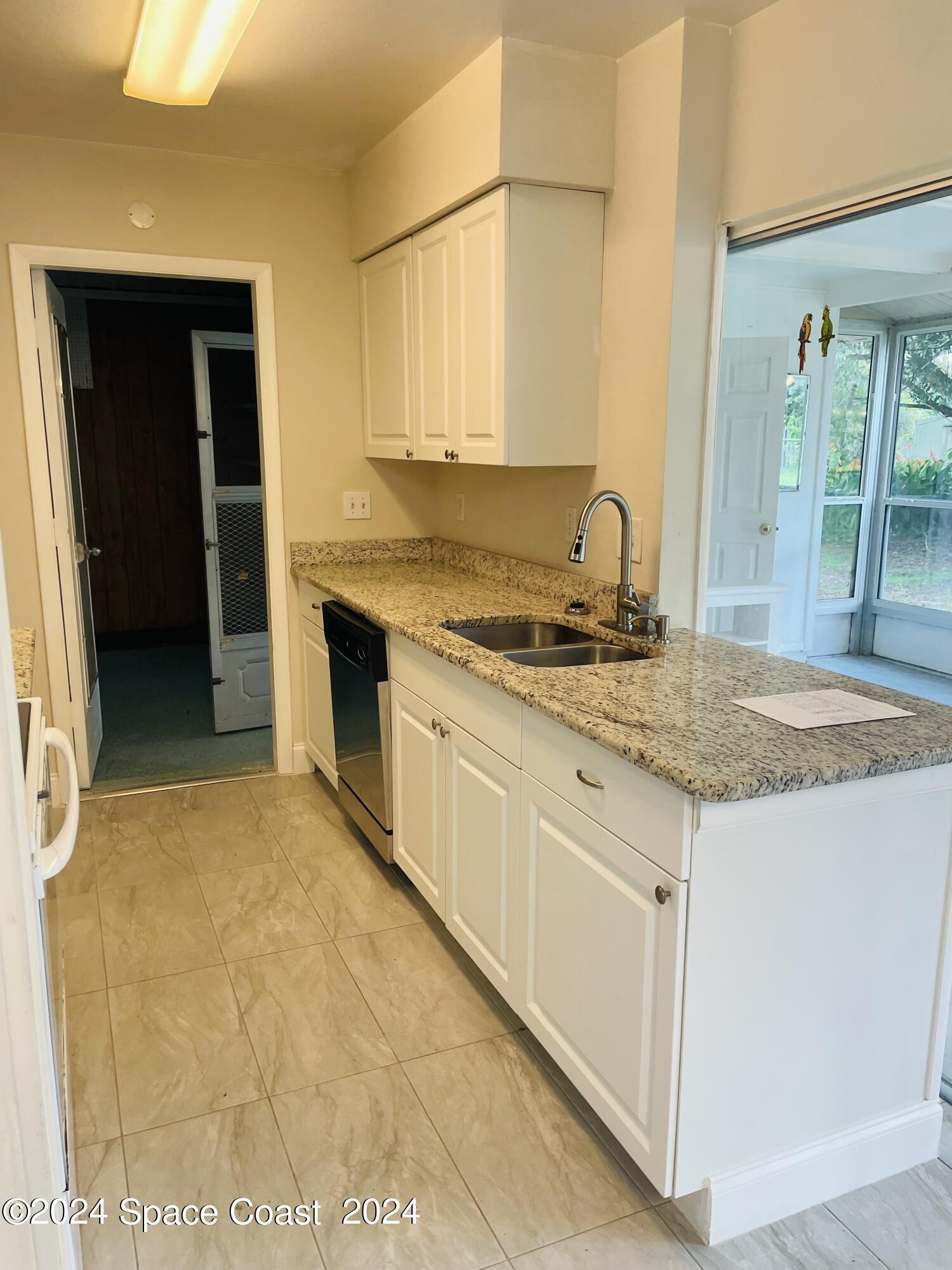 427 Rome Avenue Northeast Palm Bay, FL 32907 - Photo 11 of 20 Photo Sep 18 2024, 1 23 17 PM