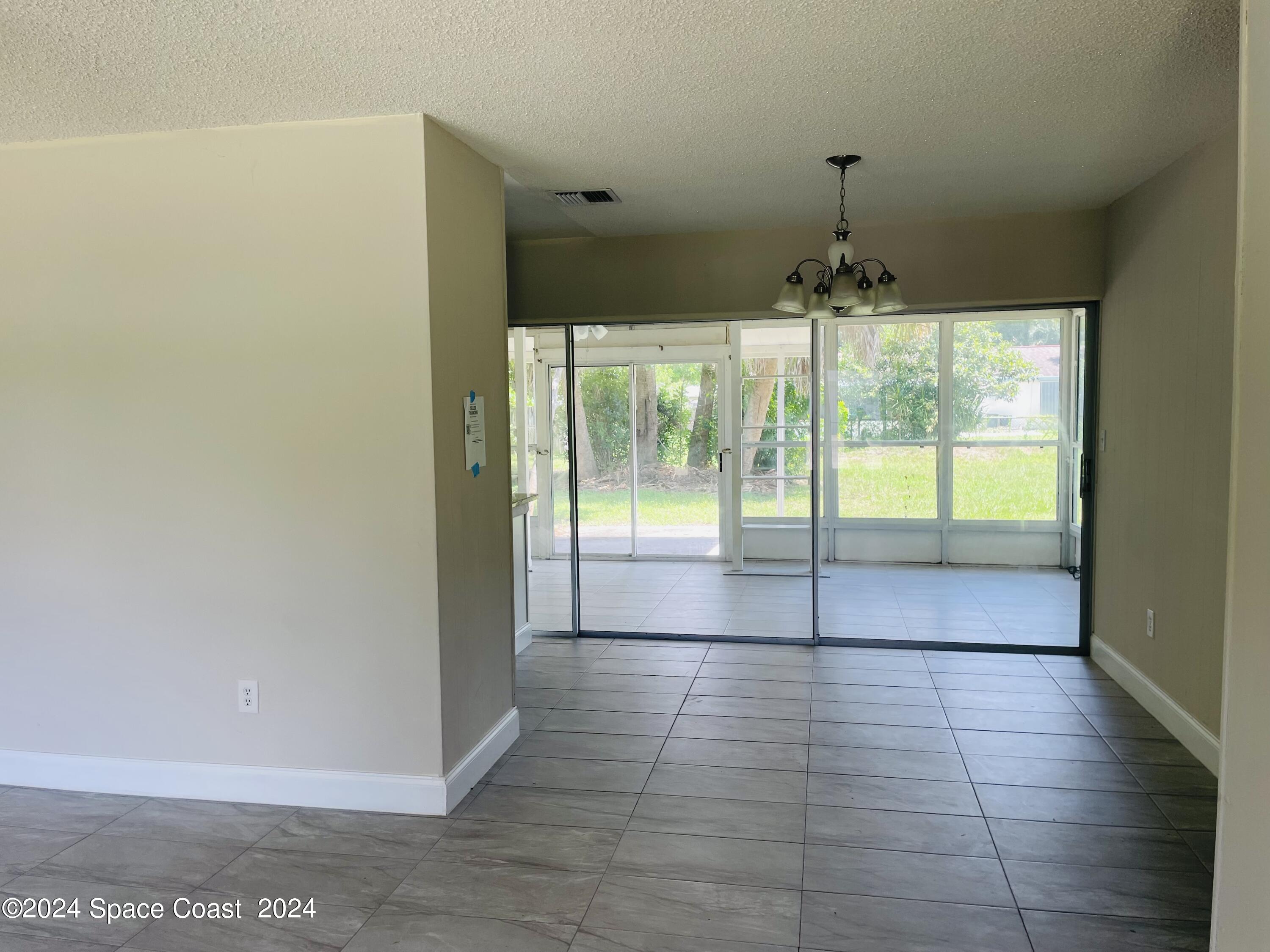 427 Rome Avenue Northeast Palm Bay, FL 32907 - Photo 3 of 20 Photo Sep 18 2024, 1 21 23 PM