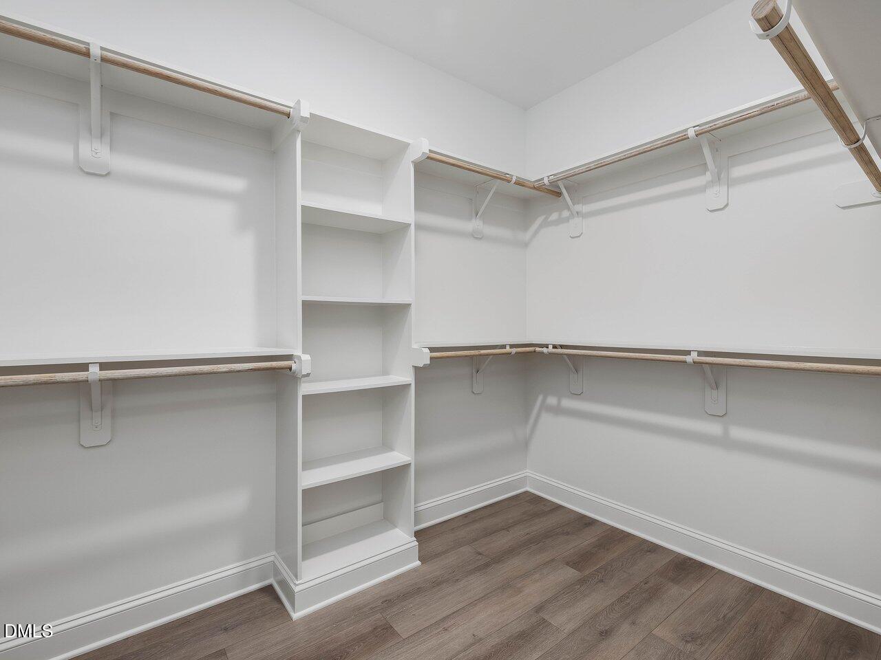 249 High Ridge Lane Pittsboro, NC 27312 - Photo 25 of 65 a view of walk in closet with empty racks