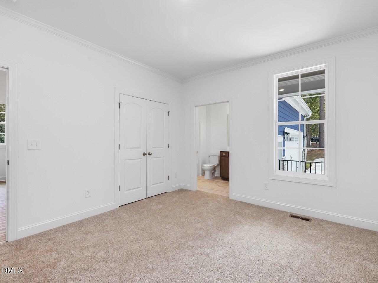 249 High Ridge Lane Pittsboro, NC 27312 - Photo 30 of 65 an empty room with windows
