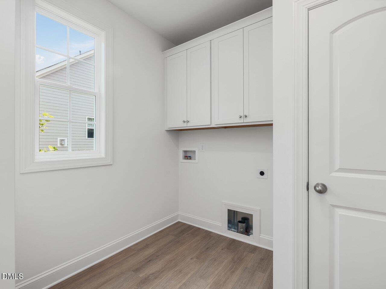 249 High Ridge Lane Pittsboro, NC 27312 - Photo 37 of 65 a view of room with hardwood floor and cabinet