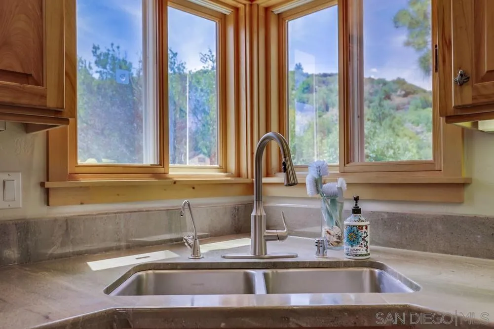 753 Ridgewood Drive Julian, CA 92036 - Photo 10 of 48 a kitchen with a sink and a window