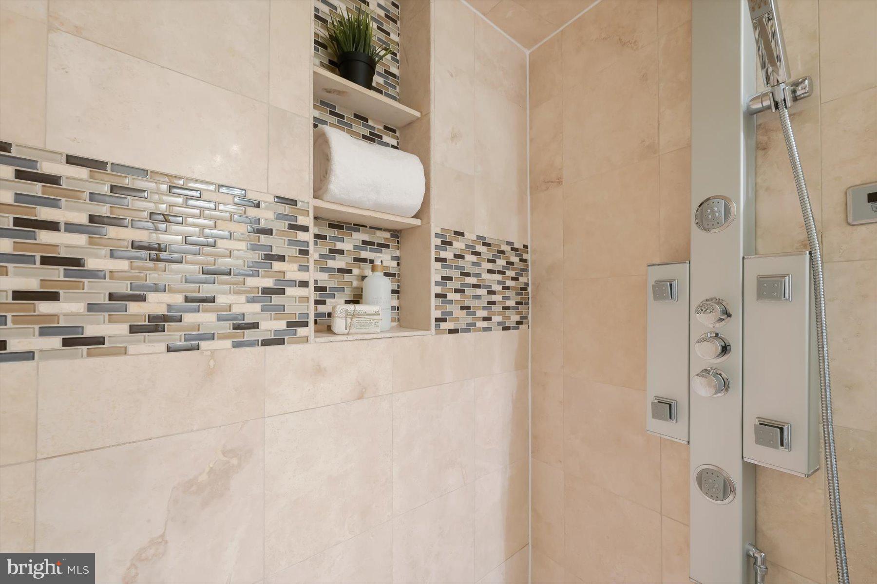 2128 1st Street Northwest, Unit 1 Washington, DC 20001 - Photo 16 of 36 a bathroom with a shower