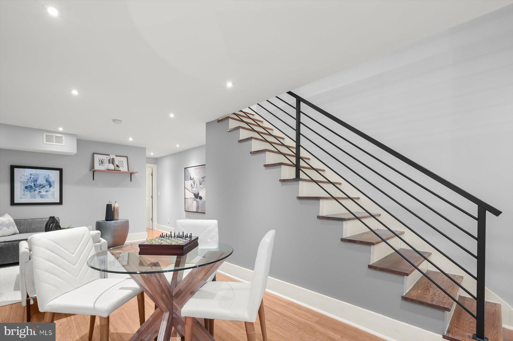 2128 1st Street Northwest, Unit 1 Washington, DC 20001 - Photo 18 of 36 a view of a dining room with furniture