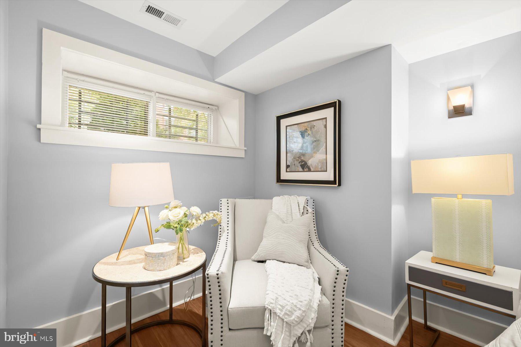 2128 1st Street Northwest, Unit 1 Washington, DC 20001 - Photo 25 of 36 a view of a livingroom with furniture and a window