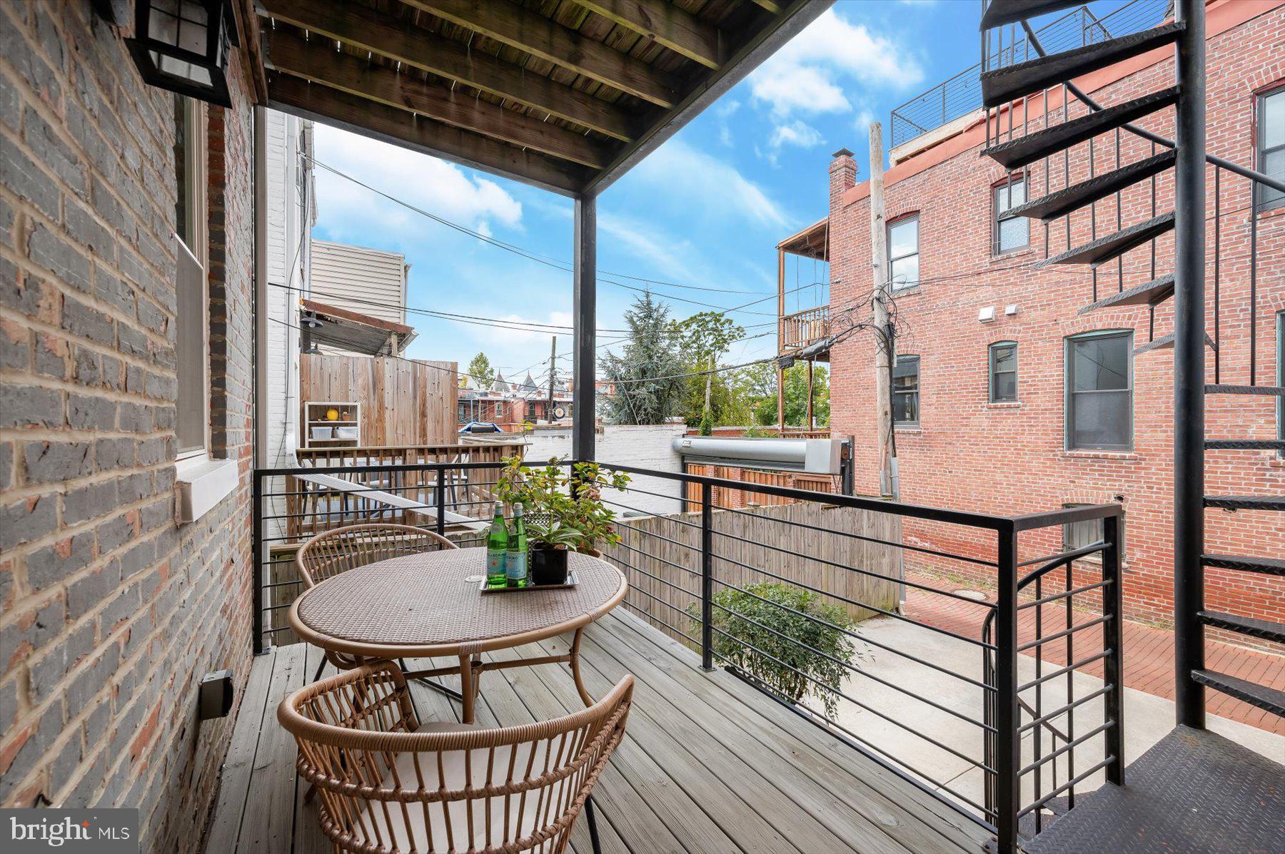 2128 1st Street Northwest, Unit 1 Washington, DC 20001 - Photo 31 of 36 a outdoor space with sitting space