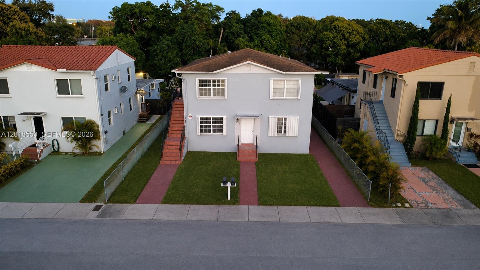 111 Southwest 31st Court Miami, FL 33135 - Photo 1 of 27 a view of house with garden space and street view
