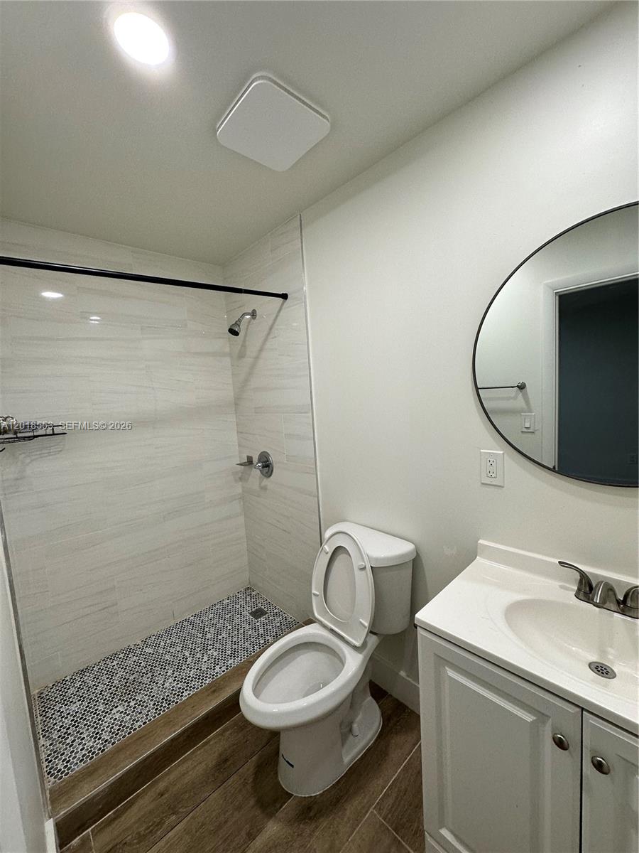 111 Southwest 31st Court Miami, FL 33135 - Photo 11 of 27 a bathroom with a sink toilet and shower