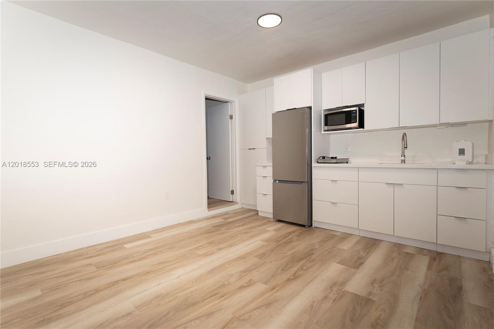 111 Southwest 31st Court Miami, FL 33135 - Photo 20 of 27 a view of a kitchen with electric appliances