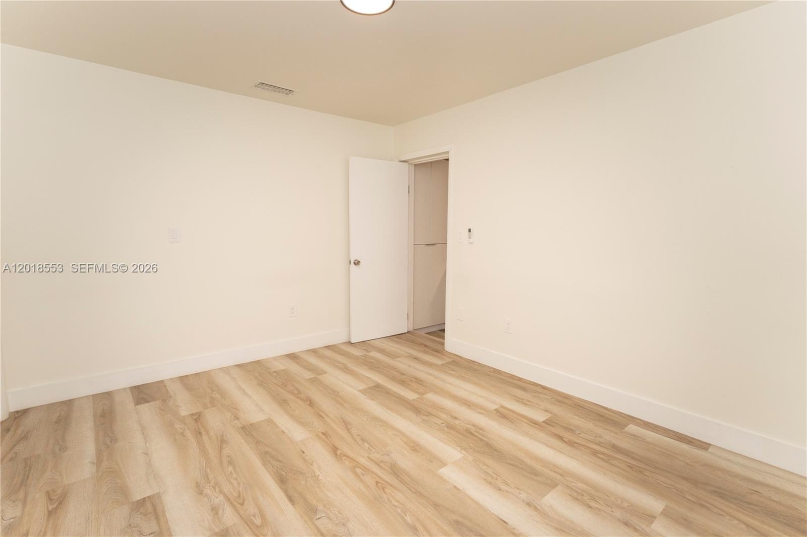 111 Southwest 31st Court Miami, FL 33135 - Photo 25 of 27 a view of empty room