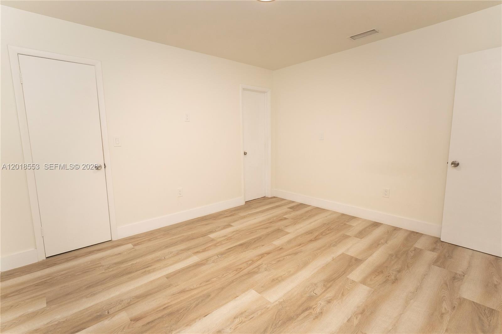111 Southwest 31st Court Miami, FL 33135 - Photo 26 of 27 a view of empty room