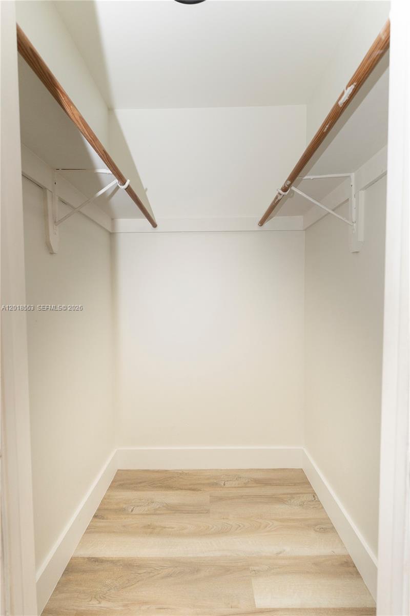 111 Southwest 31st Court Miami, FL 33135 - Photo 27 of 27 a view of a room with racks on the wall
