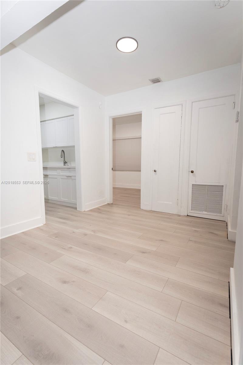 111 Southwest 31st Court Miami, FL 33135 - Photo 9 of 27 a view of empty room