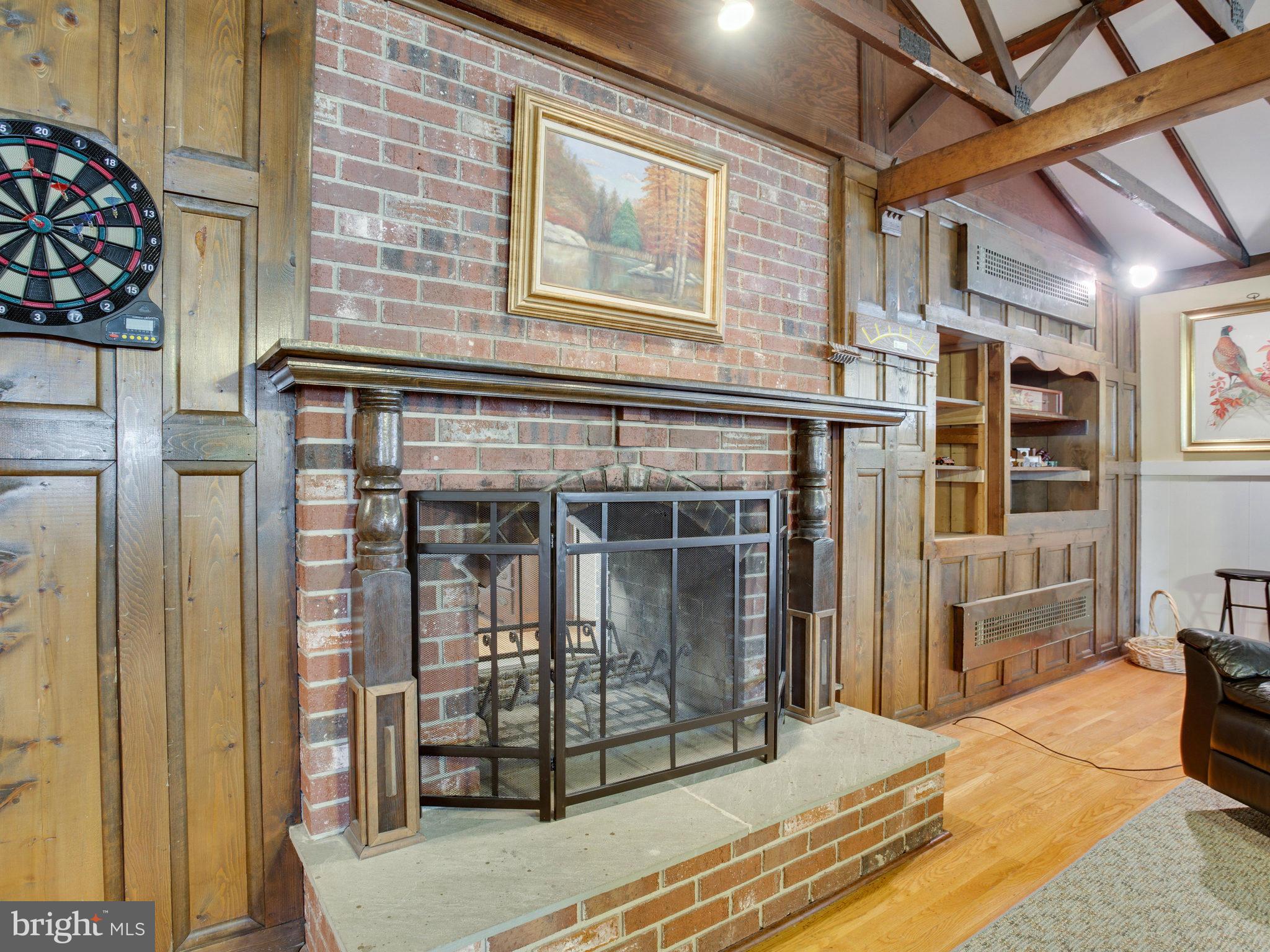 3428 Holland Cliffs Road Huntingtown, MD 20639 - Photo 22 of 28 Two sided Fireplace