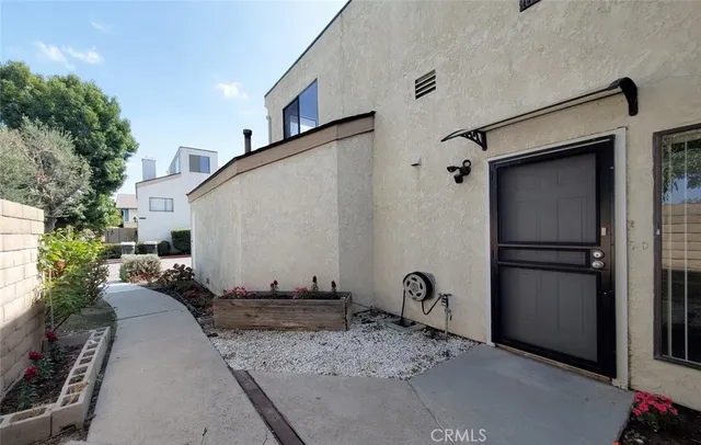 a house view with a backyard space