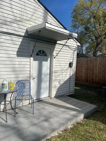 a view of a bench in the patio