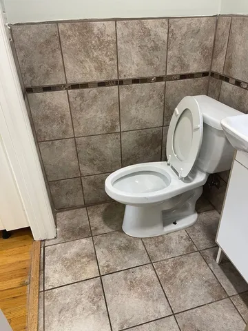a bathroom with a toilet and a sink