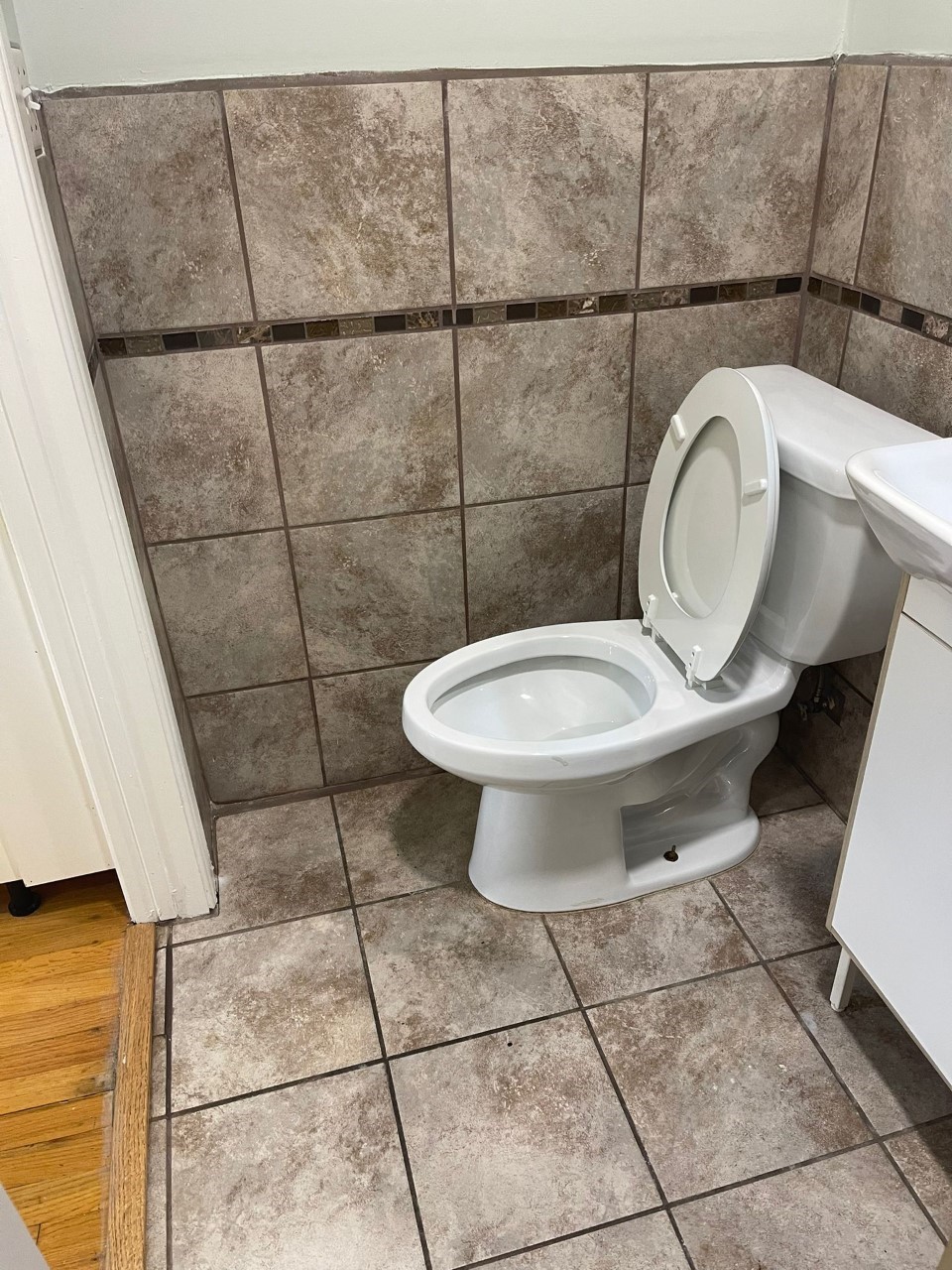 3102 Jarvis Street, Unit 2 Houston, TX 77063 - Photo 11 of 15 a bathroom with a toilet and a sink