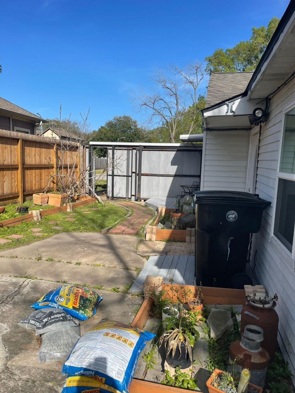 3102 Jarvis Street, Unit 2 Houston, TX 77063 - Photo 15 of 15 a front view of a house with a yard