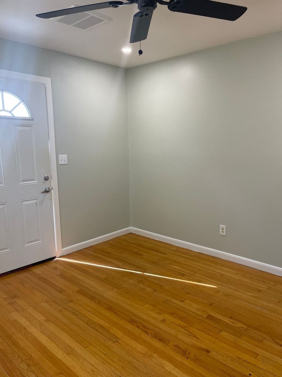 3102 Jarvis Street, Unit 2 Houston, TX 77063 - Photo 3 of 15 a view of a room with wooden floor