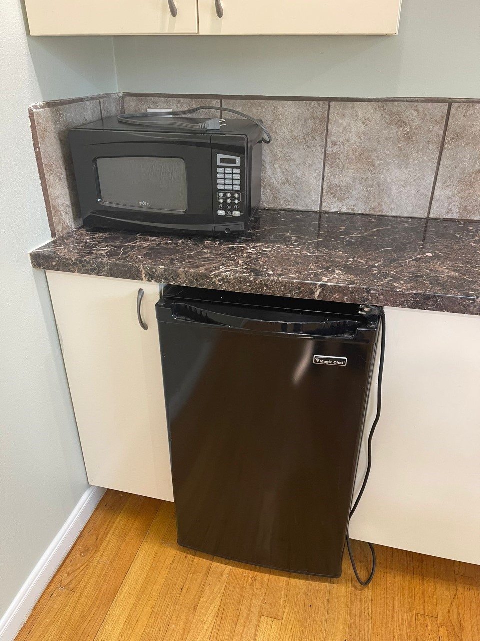 3102 Jarvis Street, Unit 2 Houston, TX 77063 - Photo 7 of 15 a kitchen with granite countertop a sink and a granite counter top