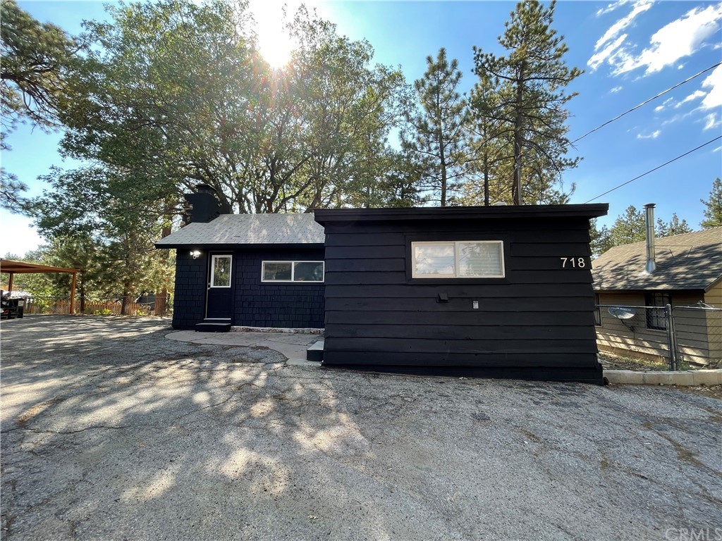 718 Talmadge Road Big Bear Lake, CA 92315 - Photo 1 of 1 a view of a house with a yard