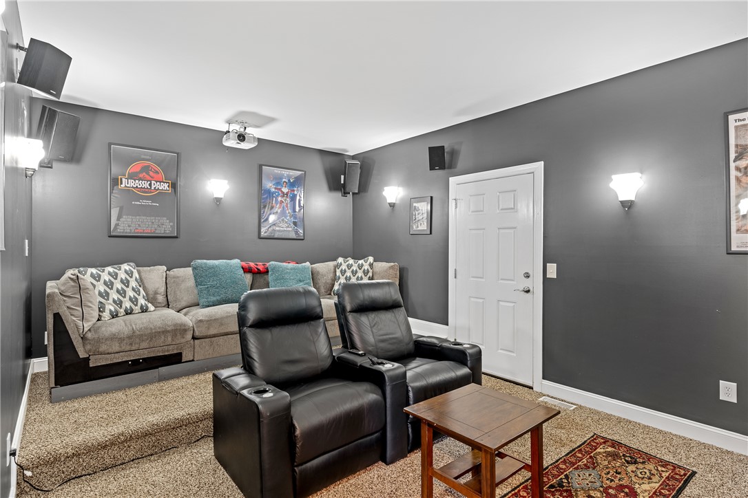 119 Turnberry Road Anderson, SC 29621 - Photo 35 of 50 This dedicated media room offers an ideal setting for cinematic entertainment at home.