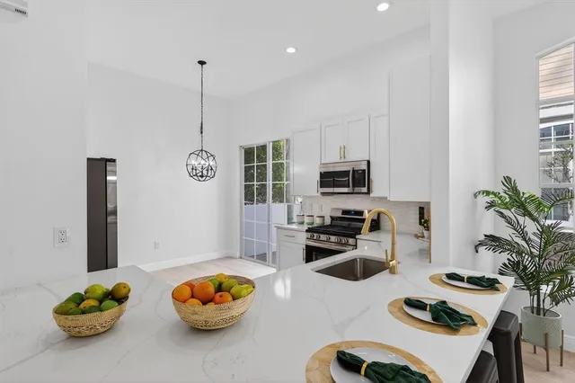 a view of a dining room with furniture window and outside view