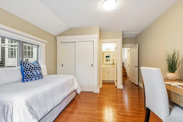 a view of a bathroom with a tub and shower