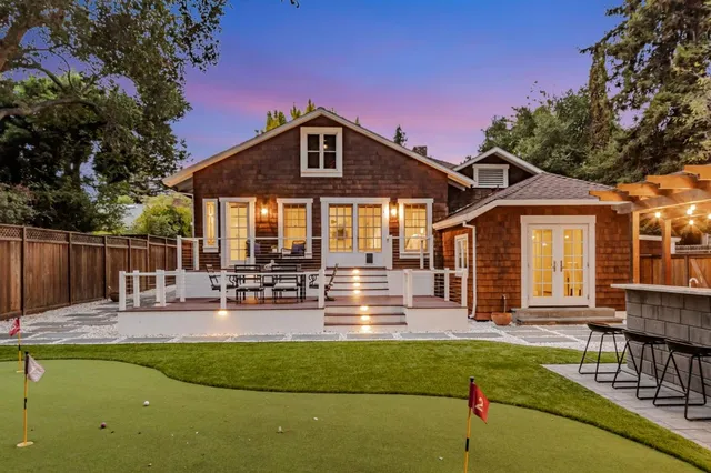 a view of a swimming pool with a patio