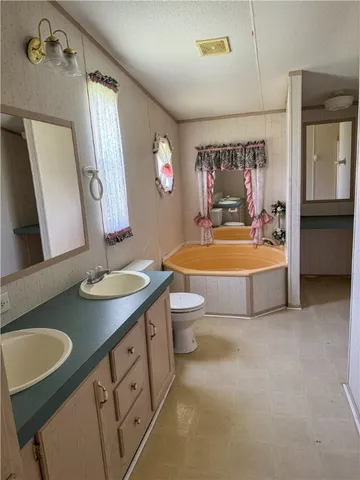 an aerial view of a house with outdoor space